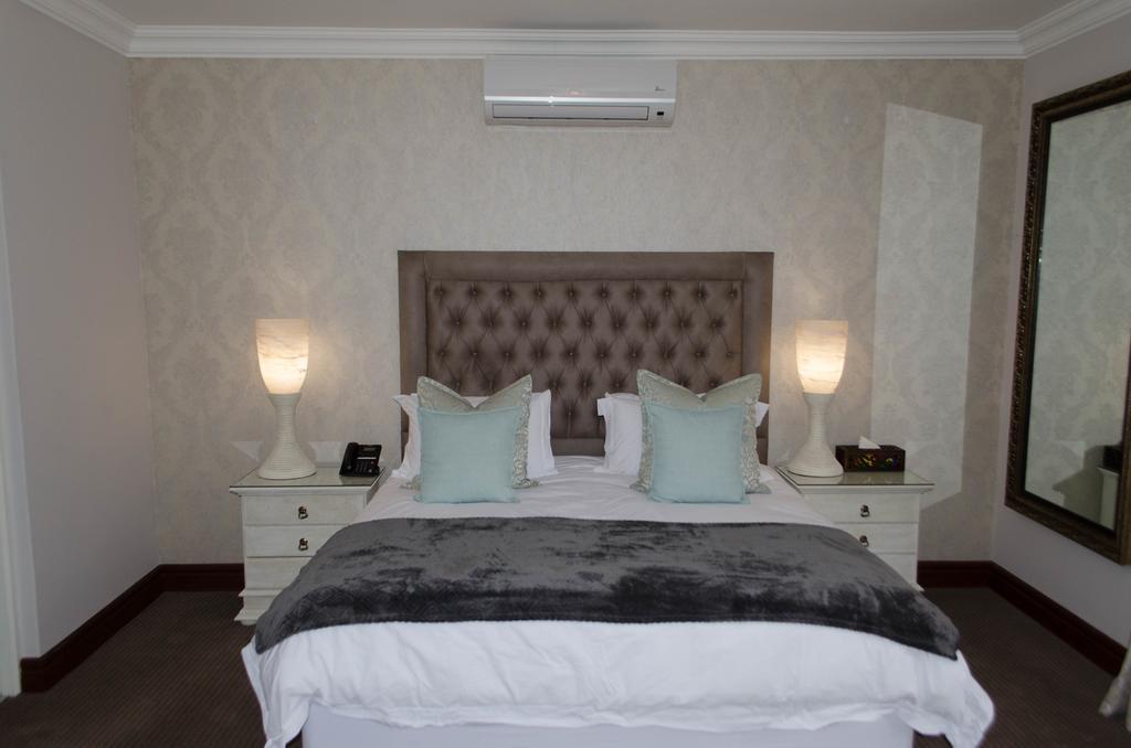 Classique Grace Boutique Hotel Sandton Quarto foto
